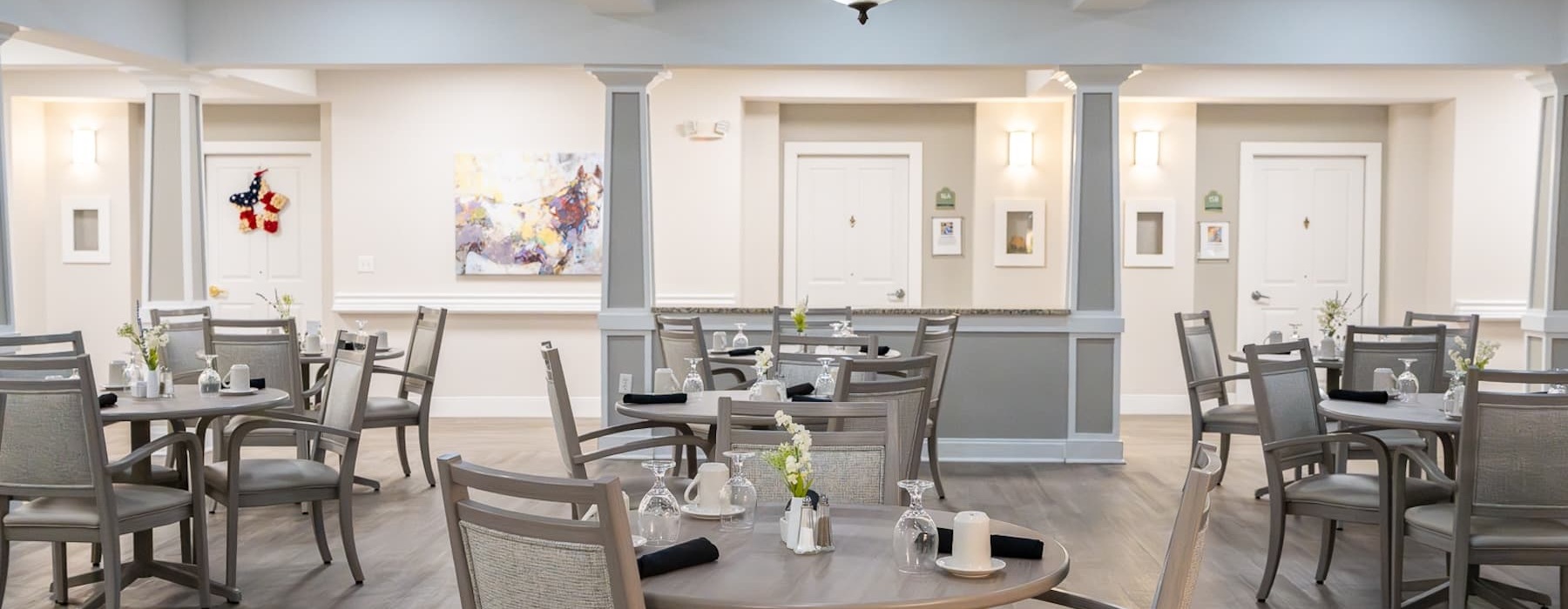 a large room with tables and chairs