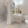 a bathroom with a shower and toilet